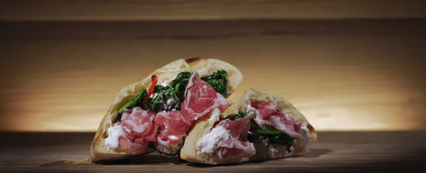 Puccia con coppa, stracciatella e cime di rapa