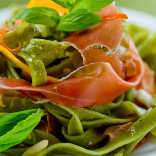 Tagliatelle with cured ham and basil